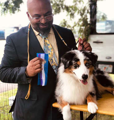 Emmett with Arvind DeBraganca at the Hackamock Kennel Club